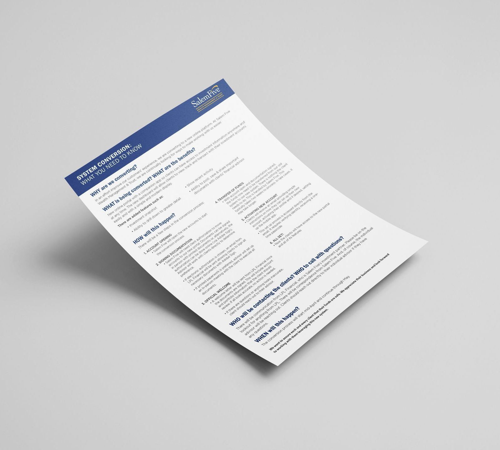 A document with blue header on a gray surface; text is legible.