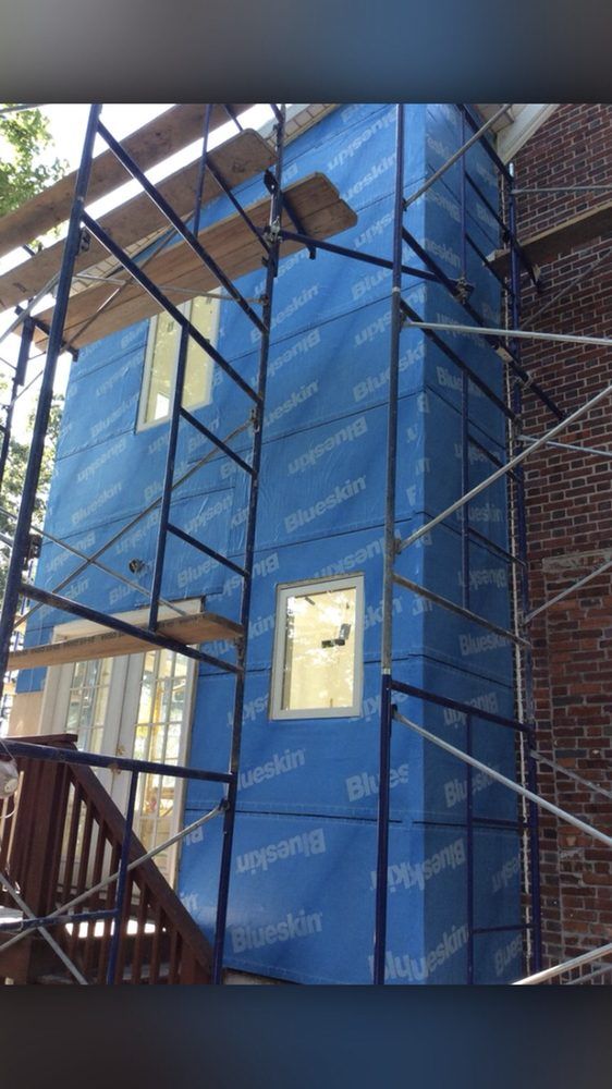 A building under construction with scaffolding around it