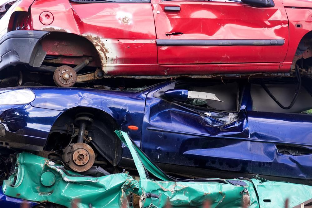 Cars Crushed and Stacked on Top of Each Other — Jap Performance T/A All Tuggerah City Auto Dismantlers in Woy Woy, NSW