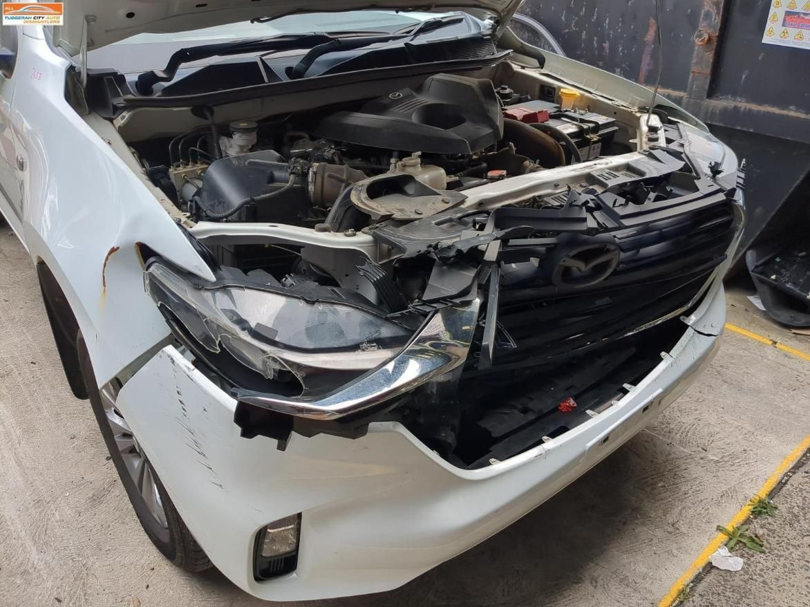 White Truck with Significant Front-End Damage — Jap Performance T/A All Tuggerah City Auto Dismantlers in Hornsby, NSW