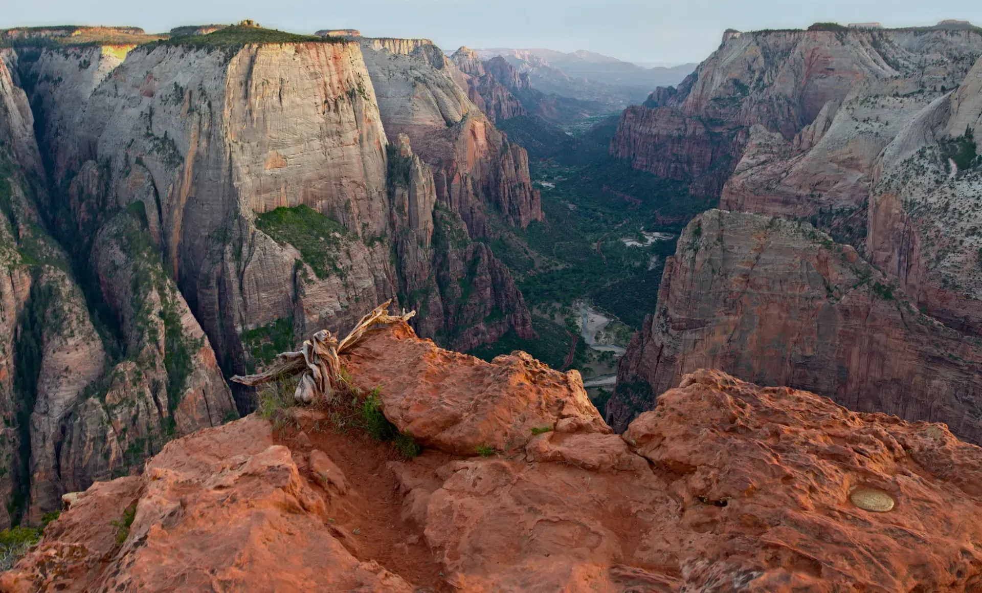 An aerial view of a canyon at sunset.