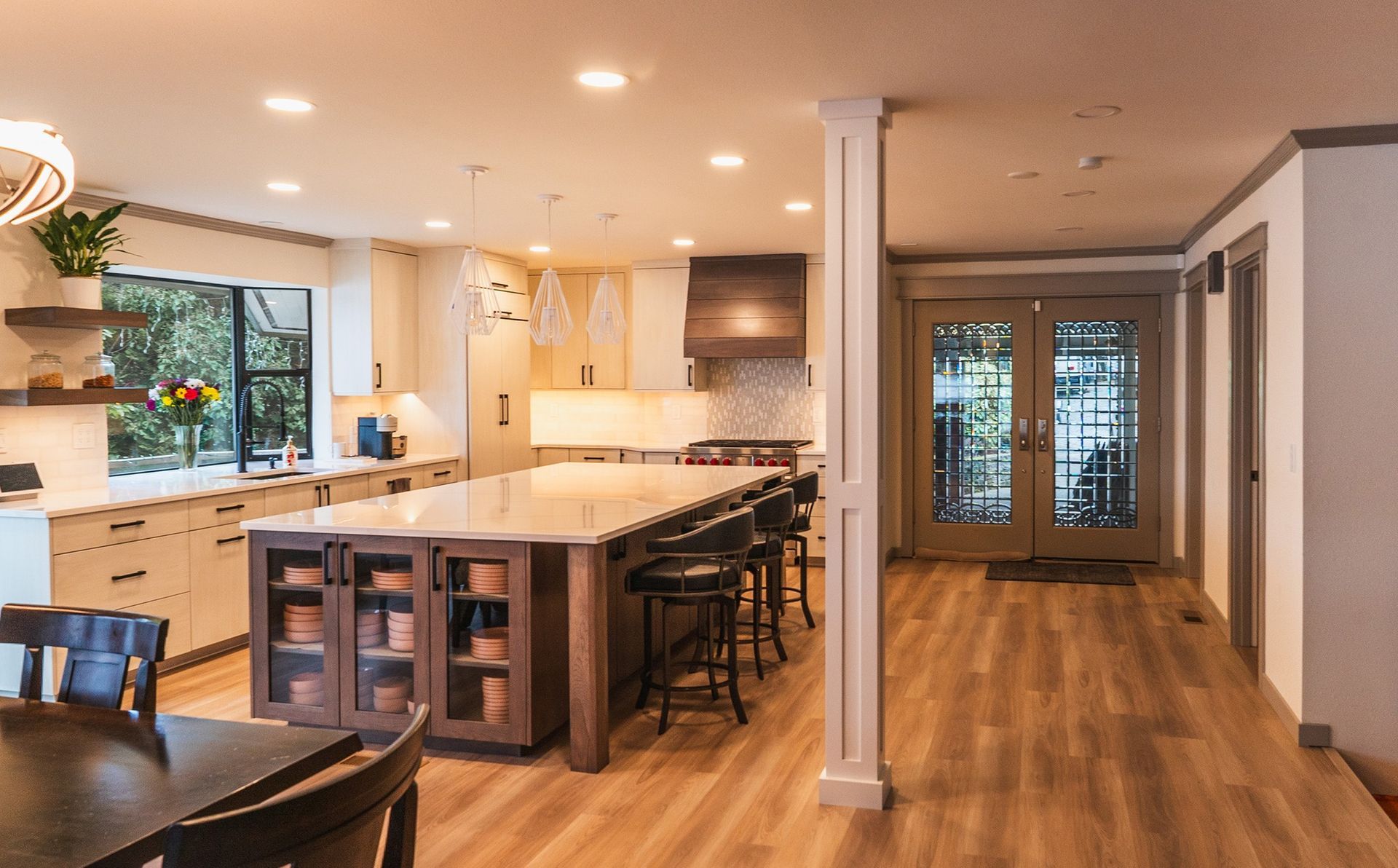 There is a large island in the middle of the kitchen.