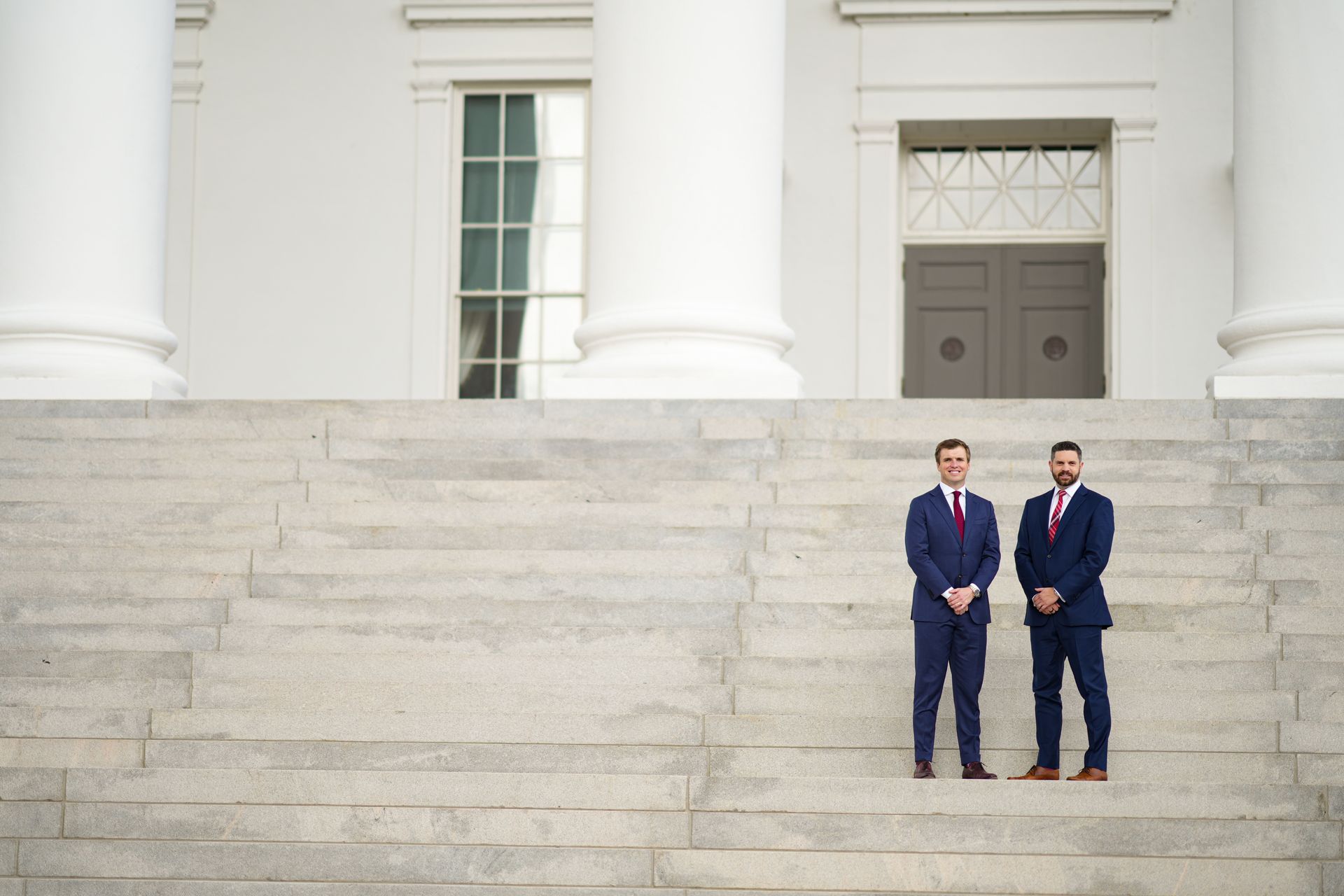 Jacob Smith and Drew Ashcraft, partners at Smith Ashcraft, on the steps of the Virginia State Capitol in Richmond