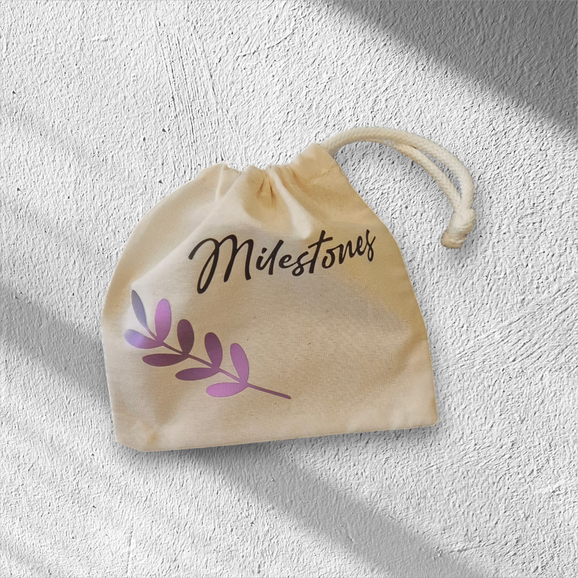 Beige tas met trekkoord, bedrukt met