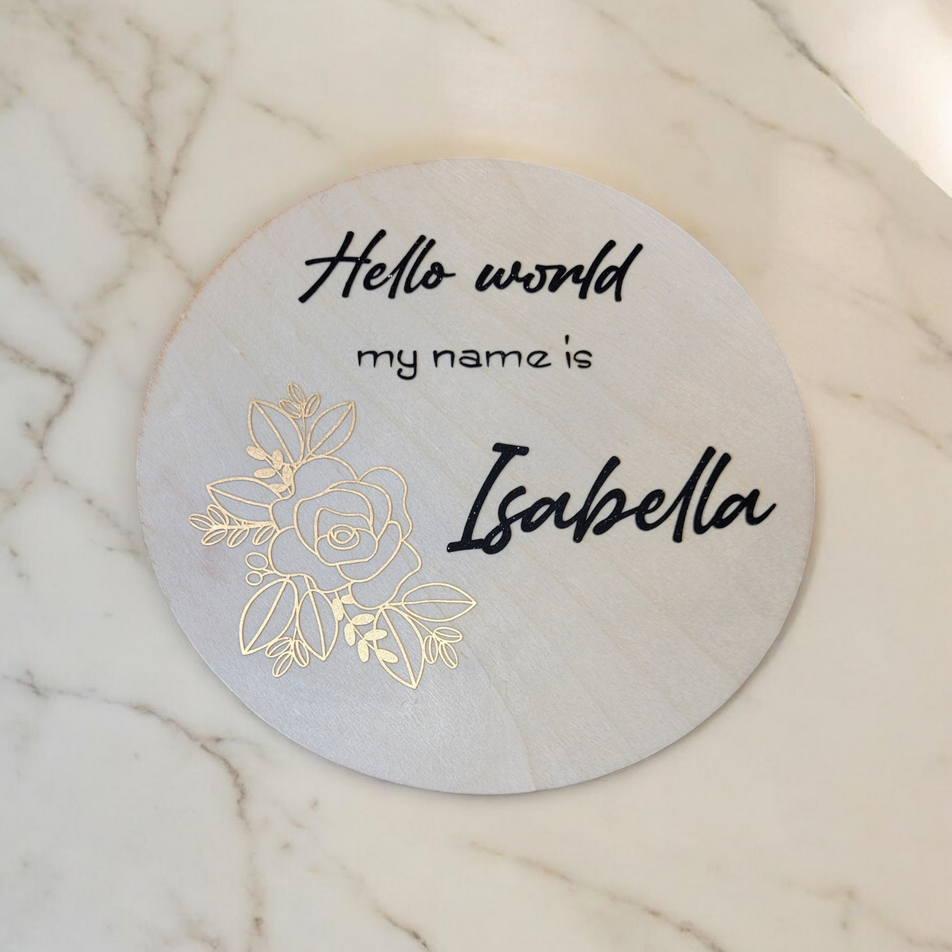 Houten schijf met 'hello world'
