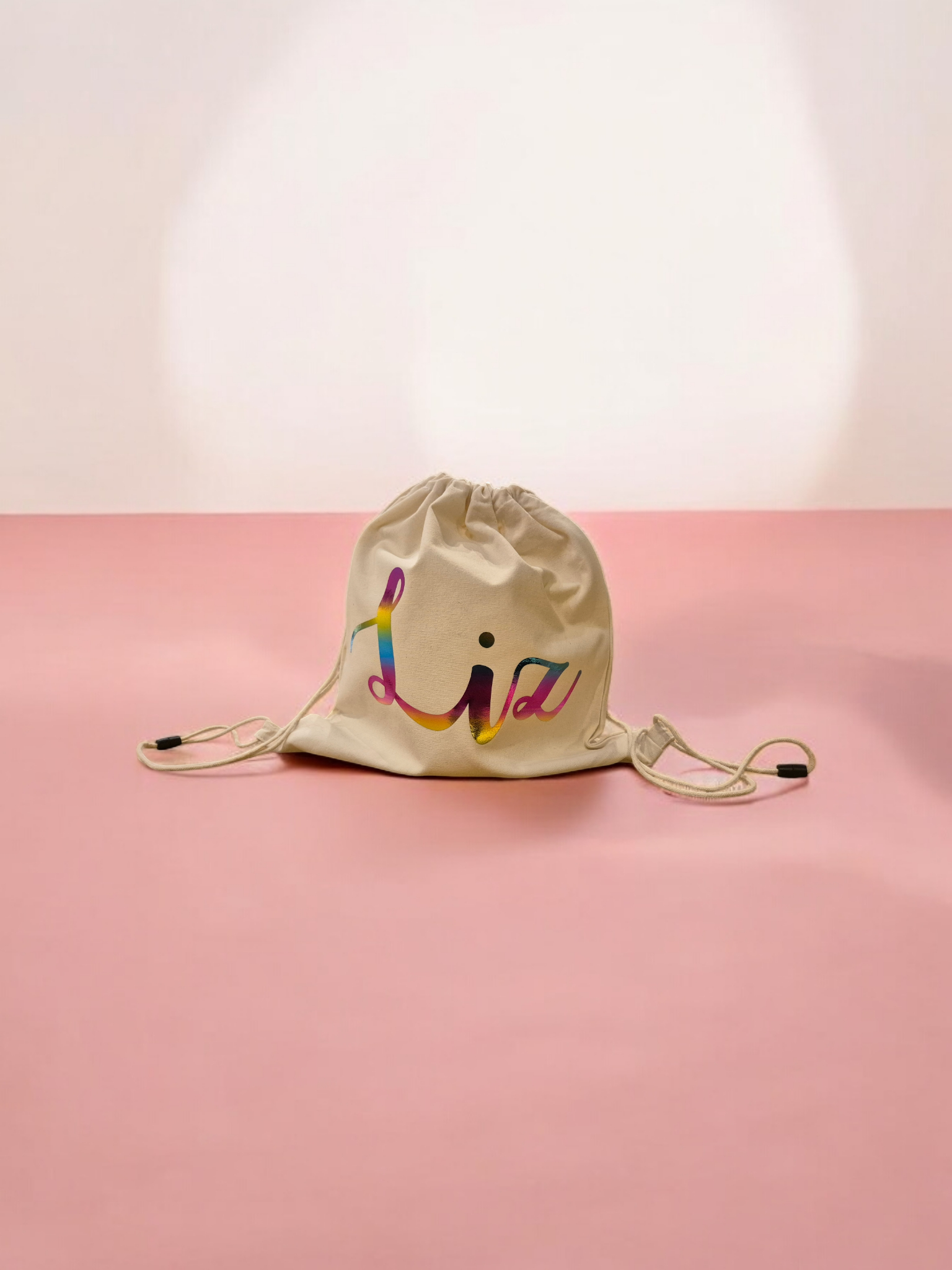 Beige tas met trekkoord, bedrukt met 