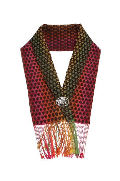A hand woven scarf with fringe and a buckle on a white background
