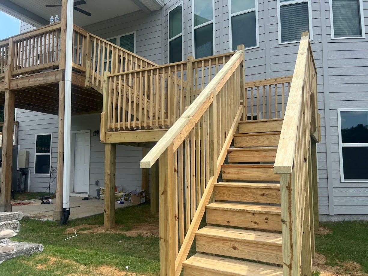 Completed brown deck installed by licensed contractors.