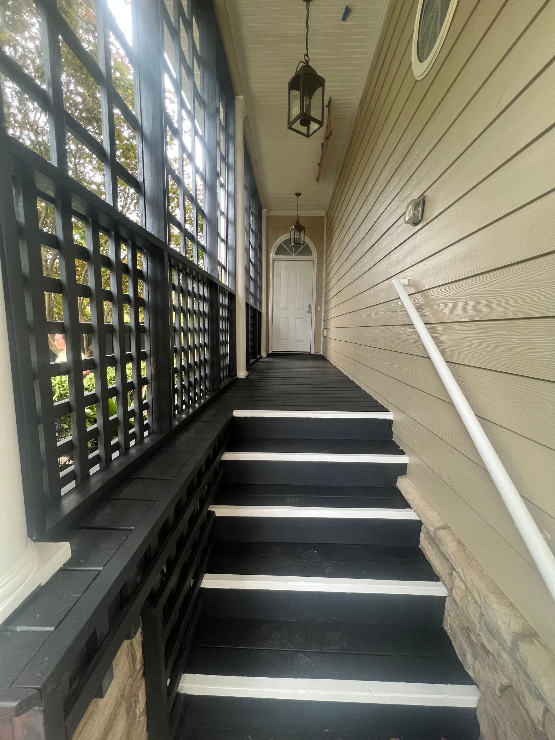 Completed brown deck installed by licensed contractors.