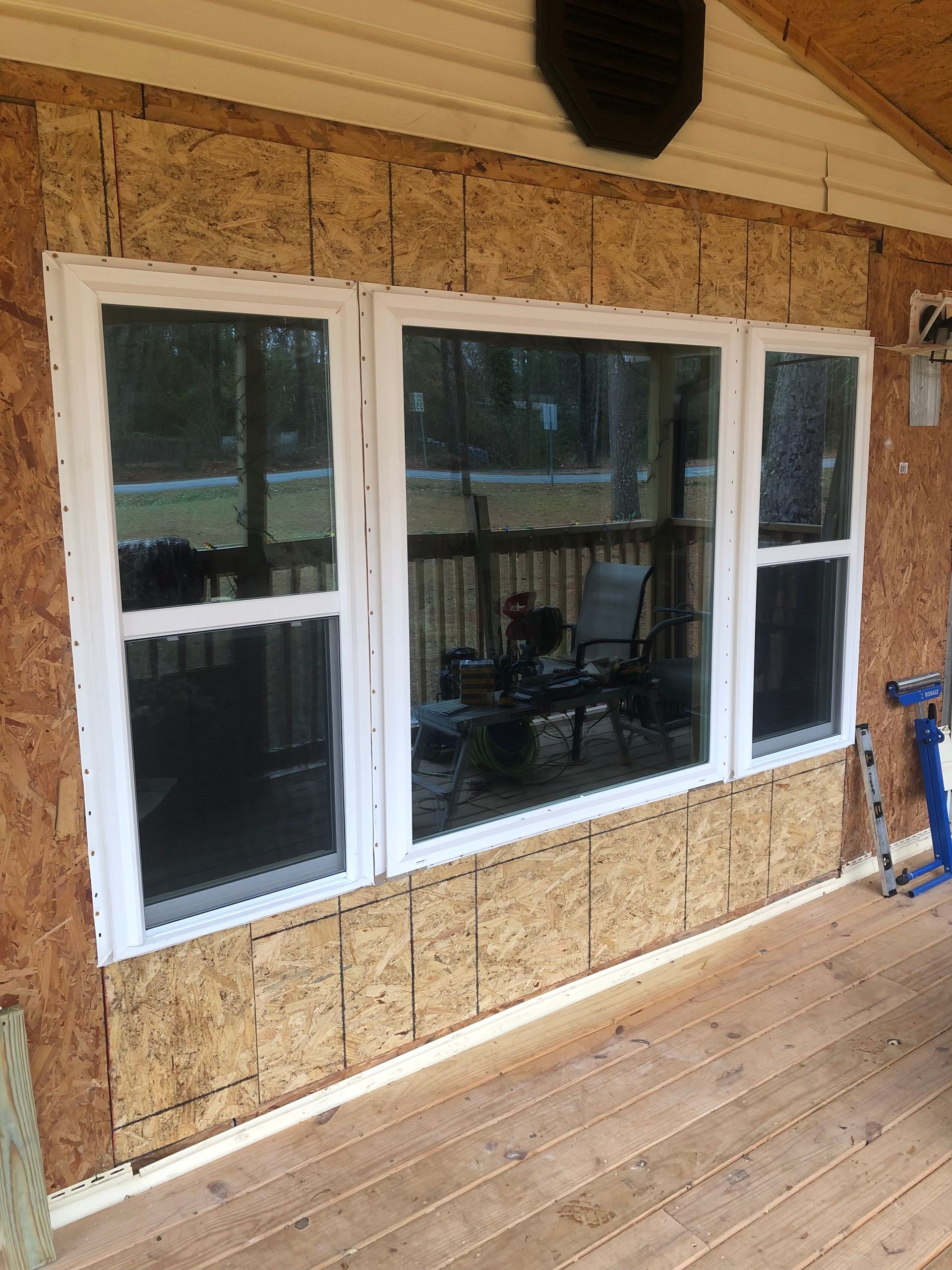 Professional contractor installing windows.