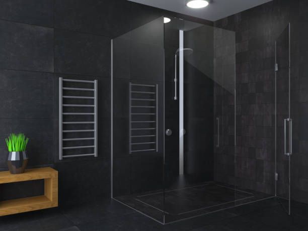 Dark glass shower installation by Dodson Glass & Mirror Inc. in Charlottesville, VA.