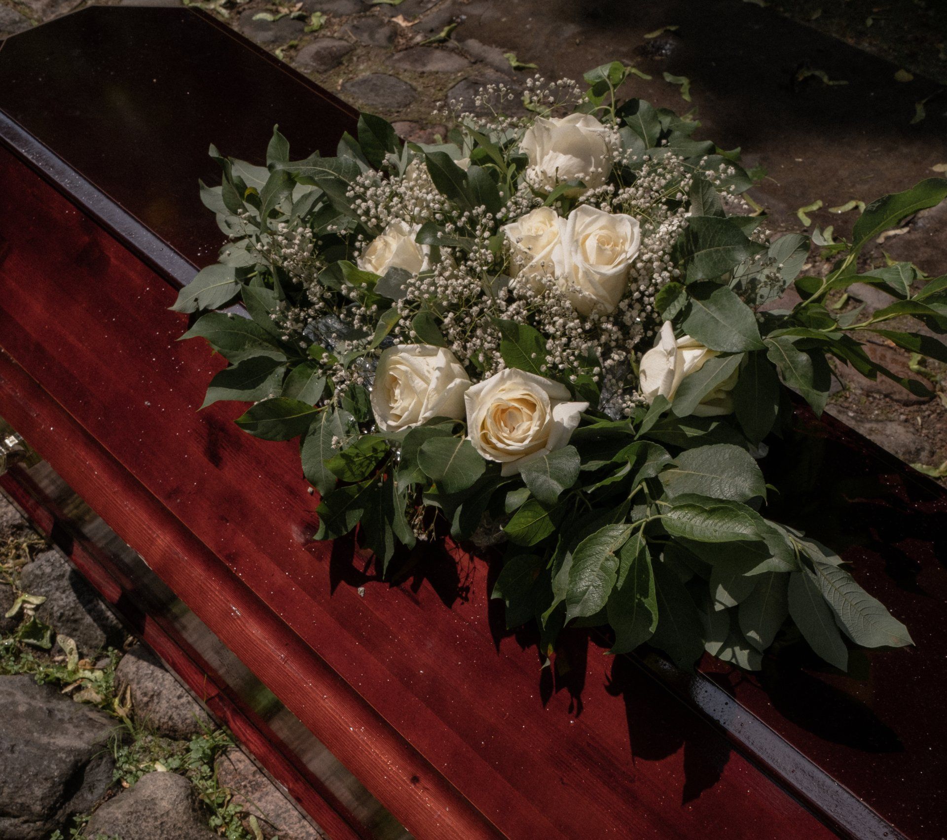 Casket with floral wreath for Non-Religious & Humanist Funerals