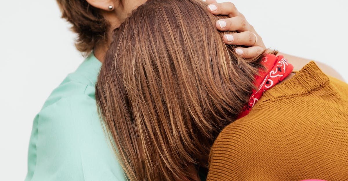 One woman consoling another