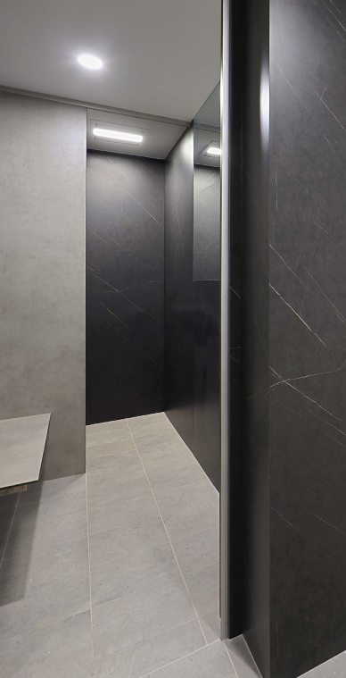 A Close Up of bathroom partition with bench seat — The Right Toilet Co In Melbourne, NSW