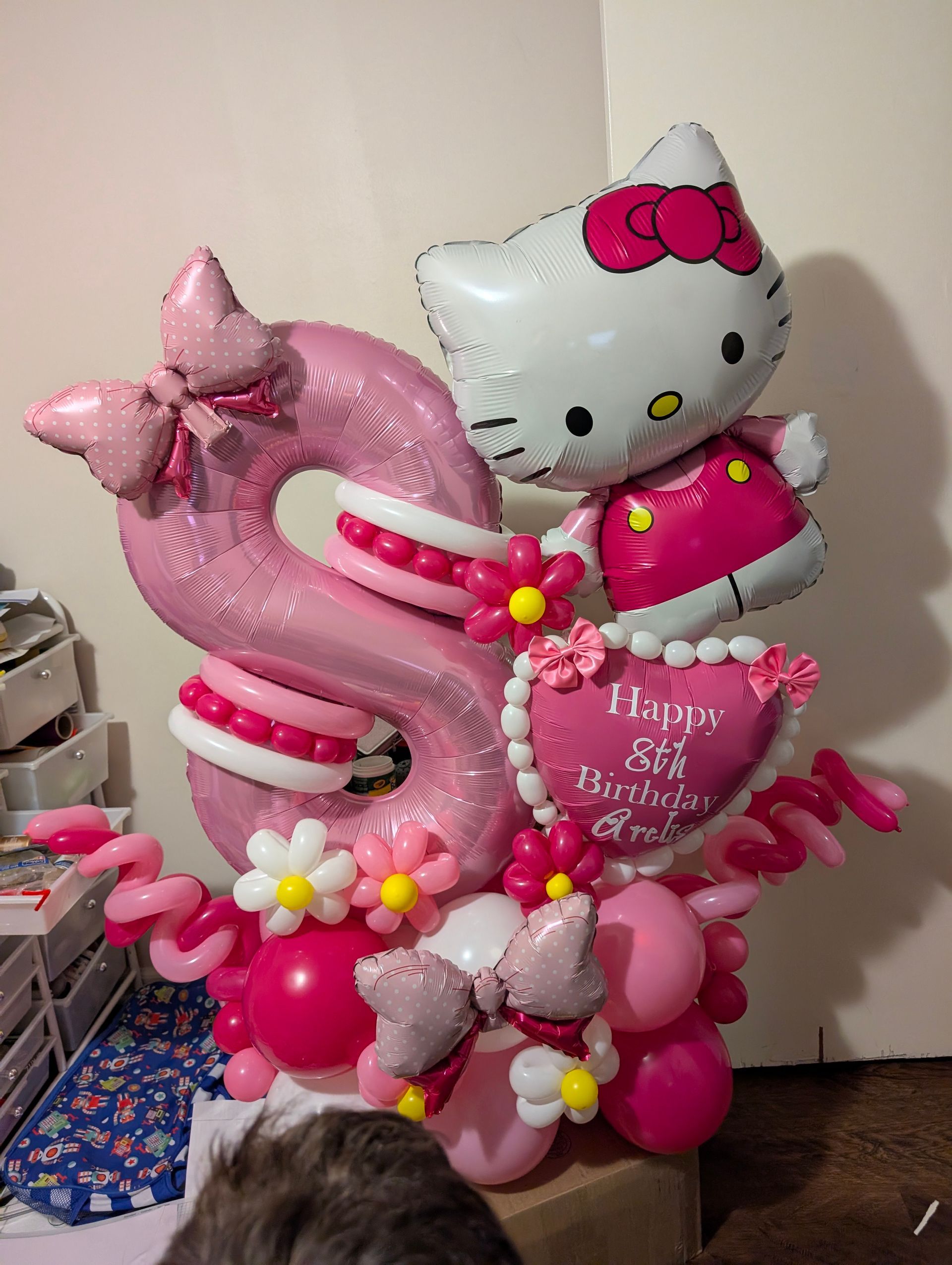 Pink balloon arrangement with 