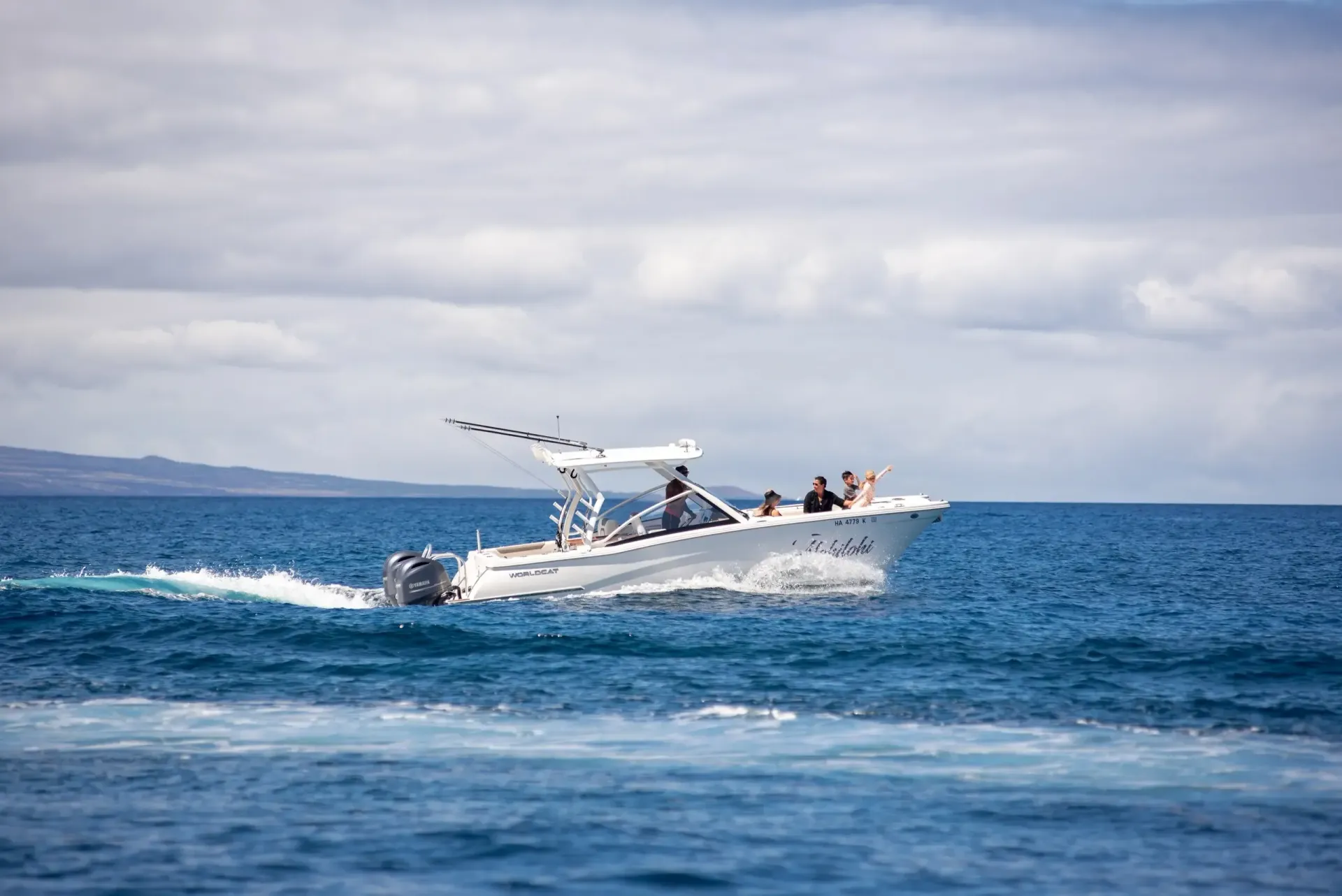 Private charter boat running the north Kohala coastline on an all day Big Island cruise