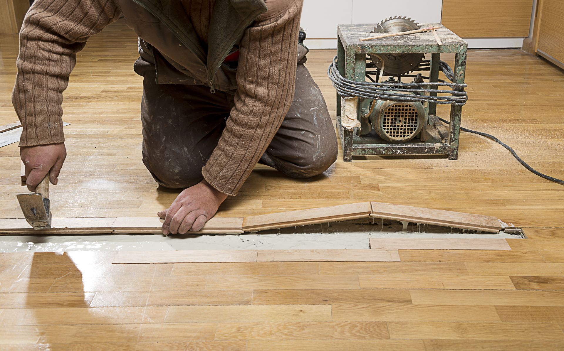 Man Doing Floor Restoration