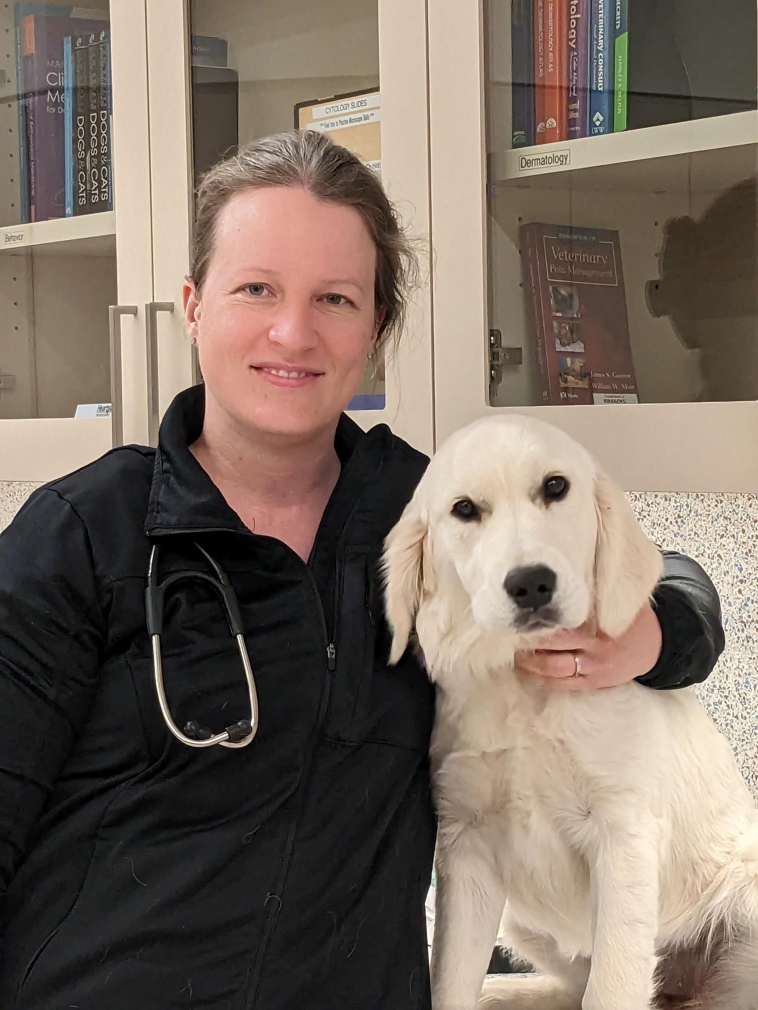 A dog with one of our doctors