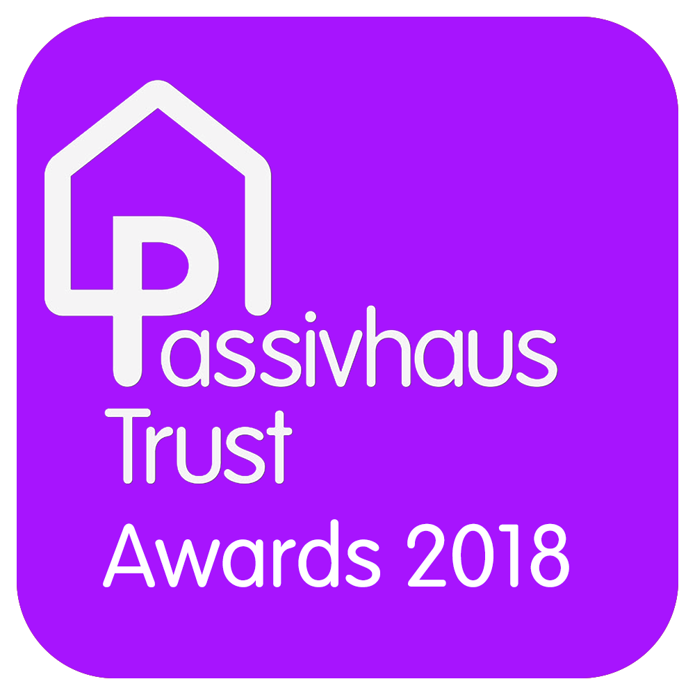 Purple logo reading “Passivhaus Trust Awards 2018” with a white house icon.