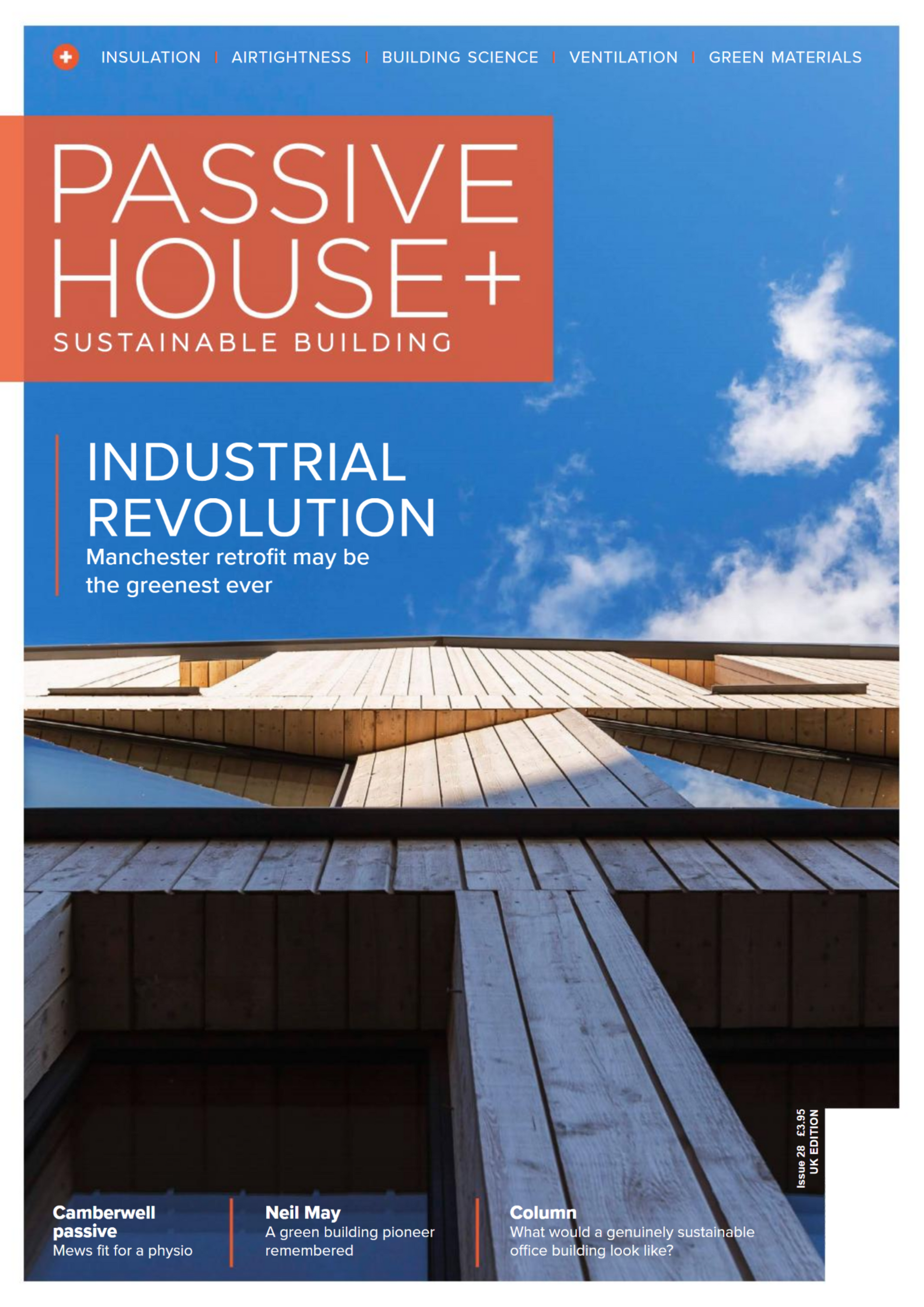 Magazine cover titled “Passive House+” over a photo of a modern wooden building under a blue sky.
