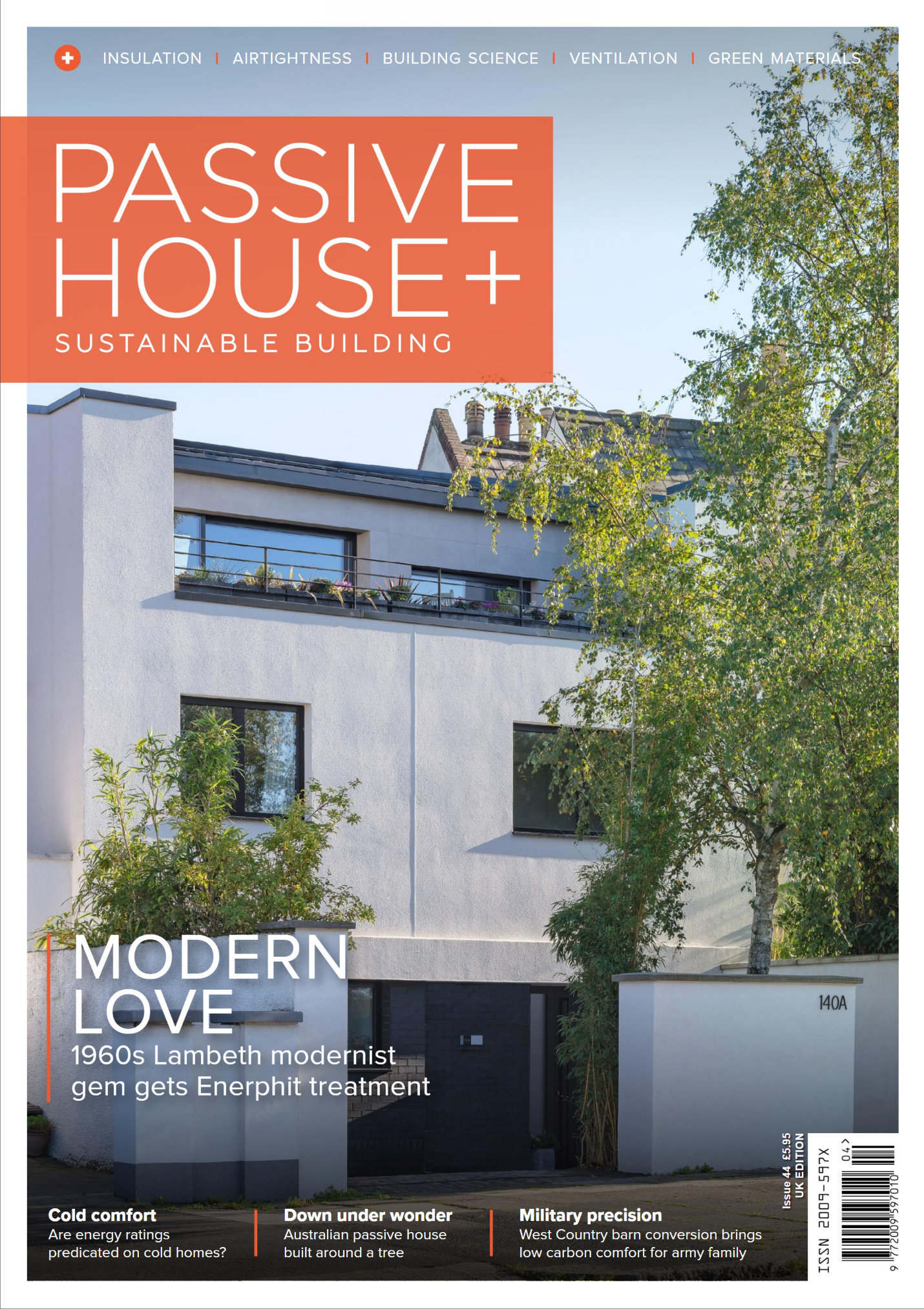 Passivhaus+ magazine cover featuring a modern home exterior under a blue sky