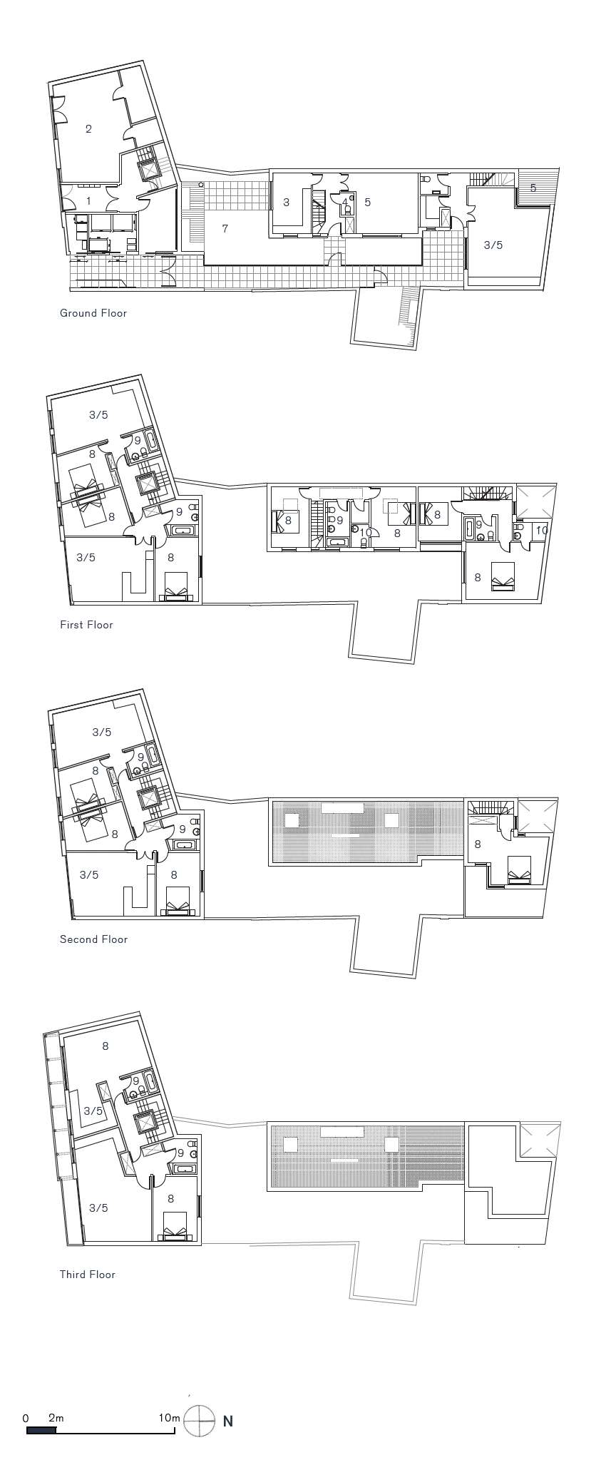 Grayscale architectural floor plan sheets showing room layouts, walls, and measurements.