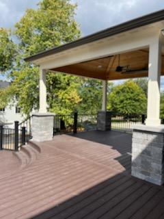 Man Repairing Deck — White Lake, MI — MICHIGAN CONSTRUCTION GROUP