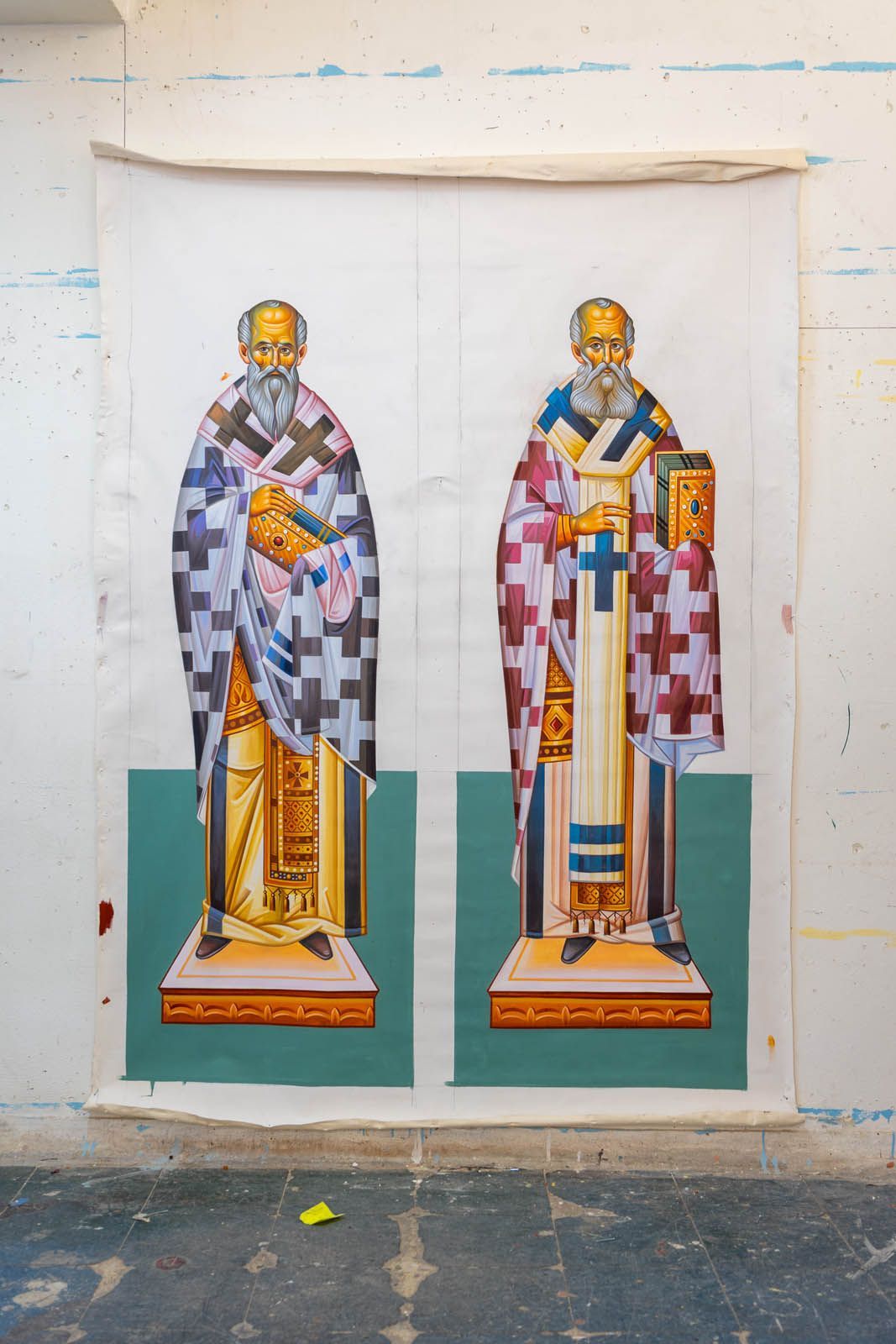 Hand-painted Eastern Christian Russian iconography of Saints Basil and Nicholas full-body hierachs on canvas in studio