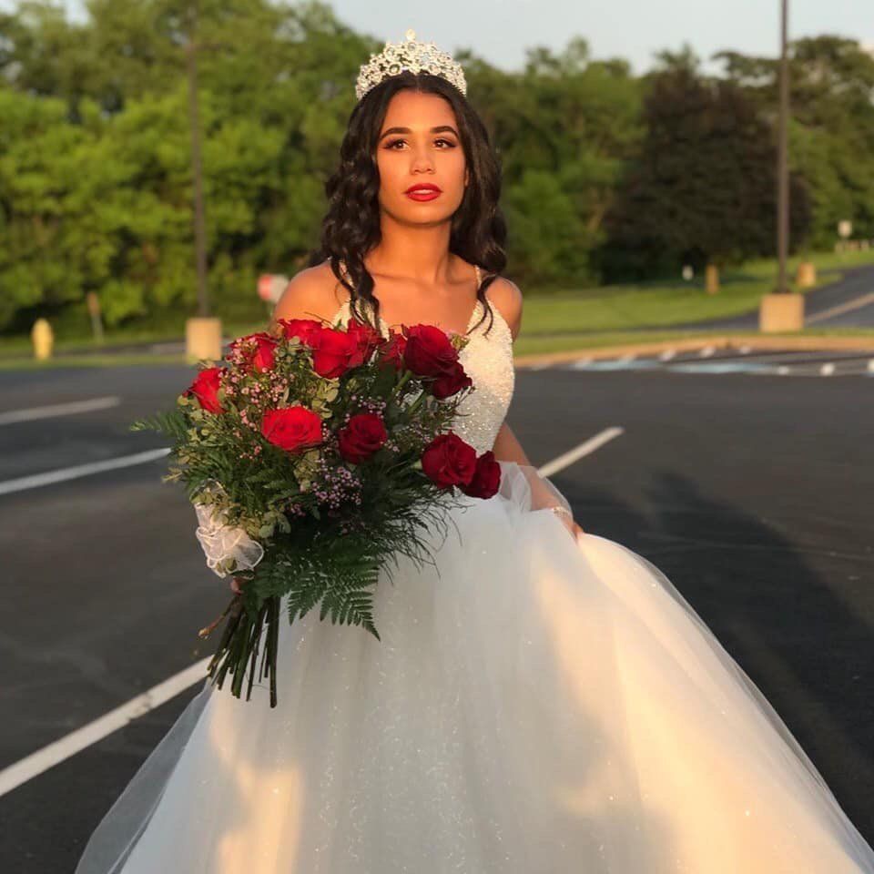 Girl in white gown holding bouquet in Washington, PA