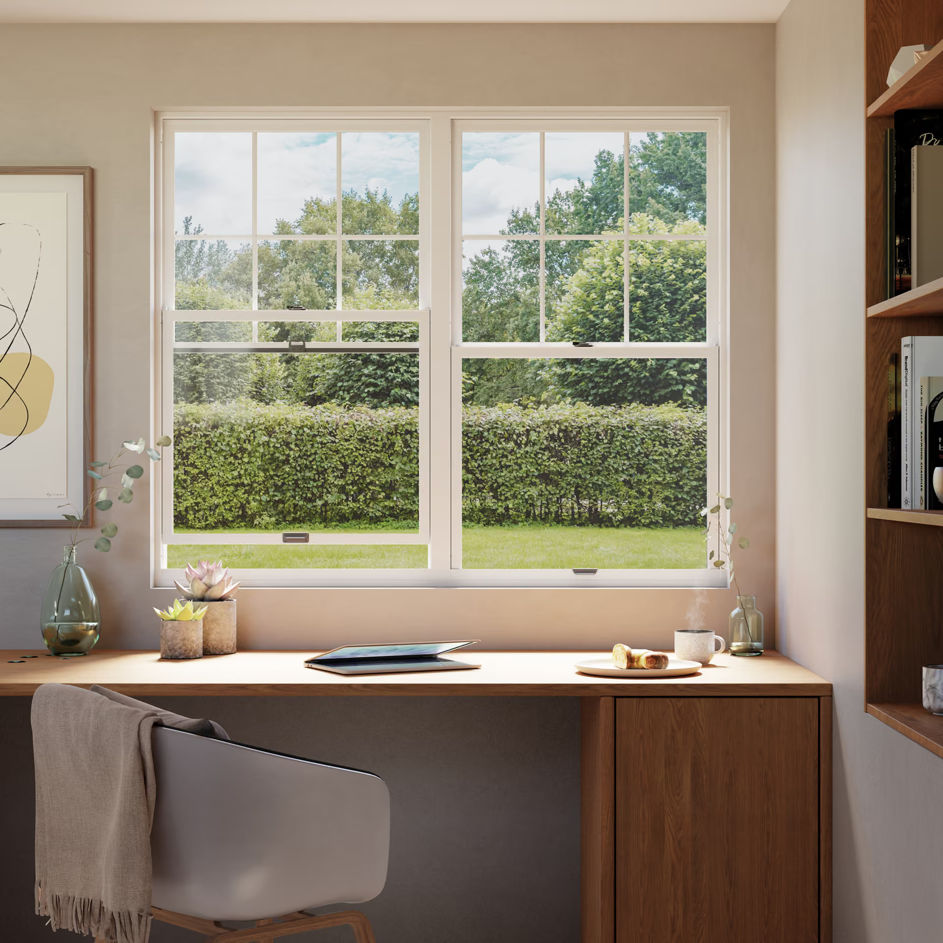 Bright home office with desk by a large window overlooking a green garden.