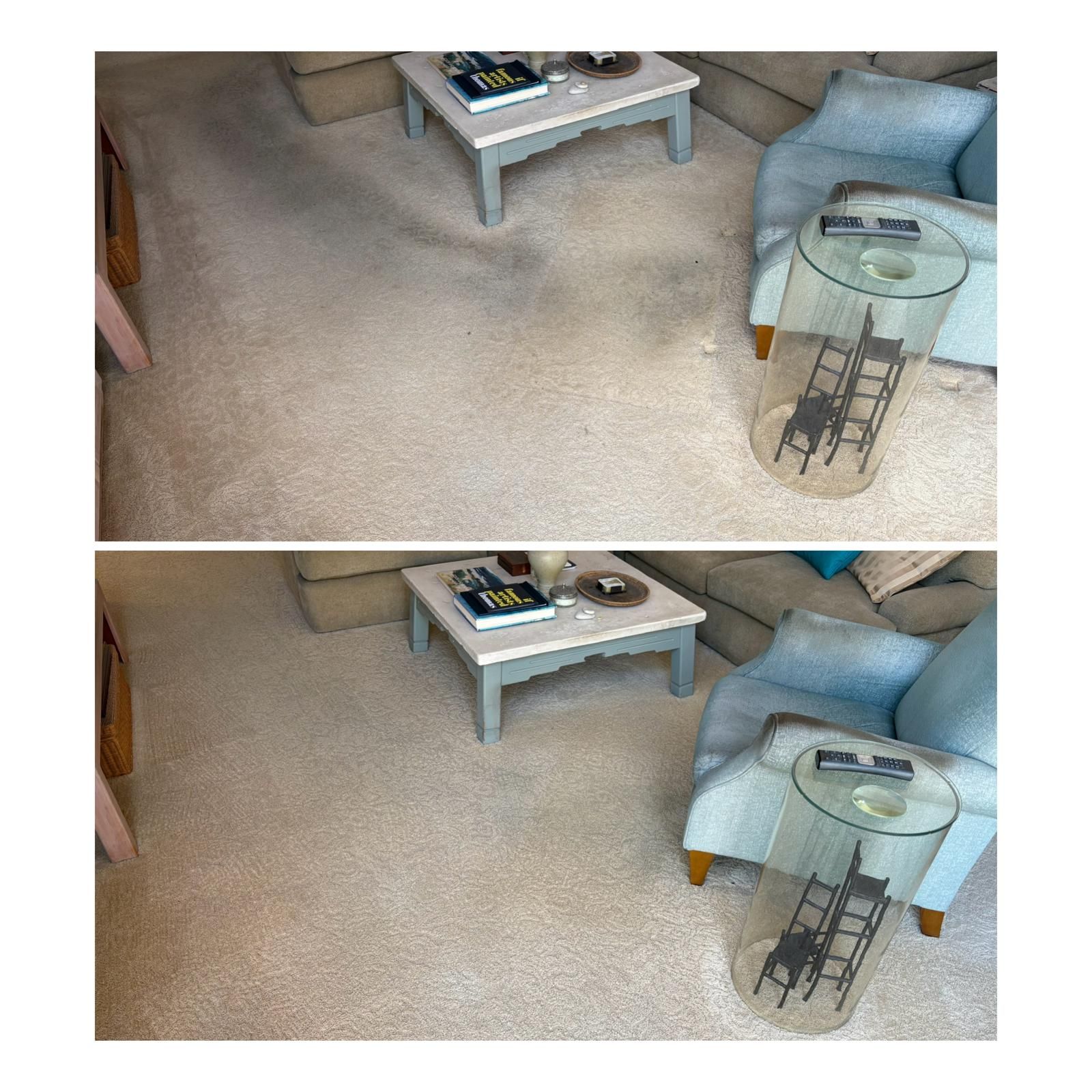 Living room with beige carpet, blue armchair, glass side table, and white coffee table