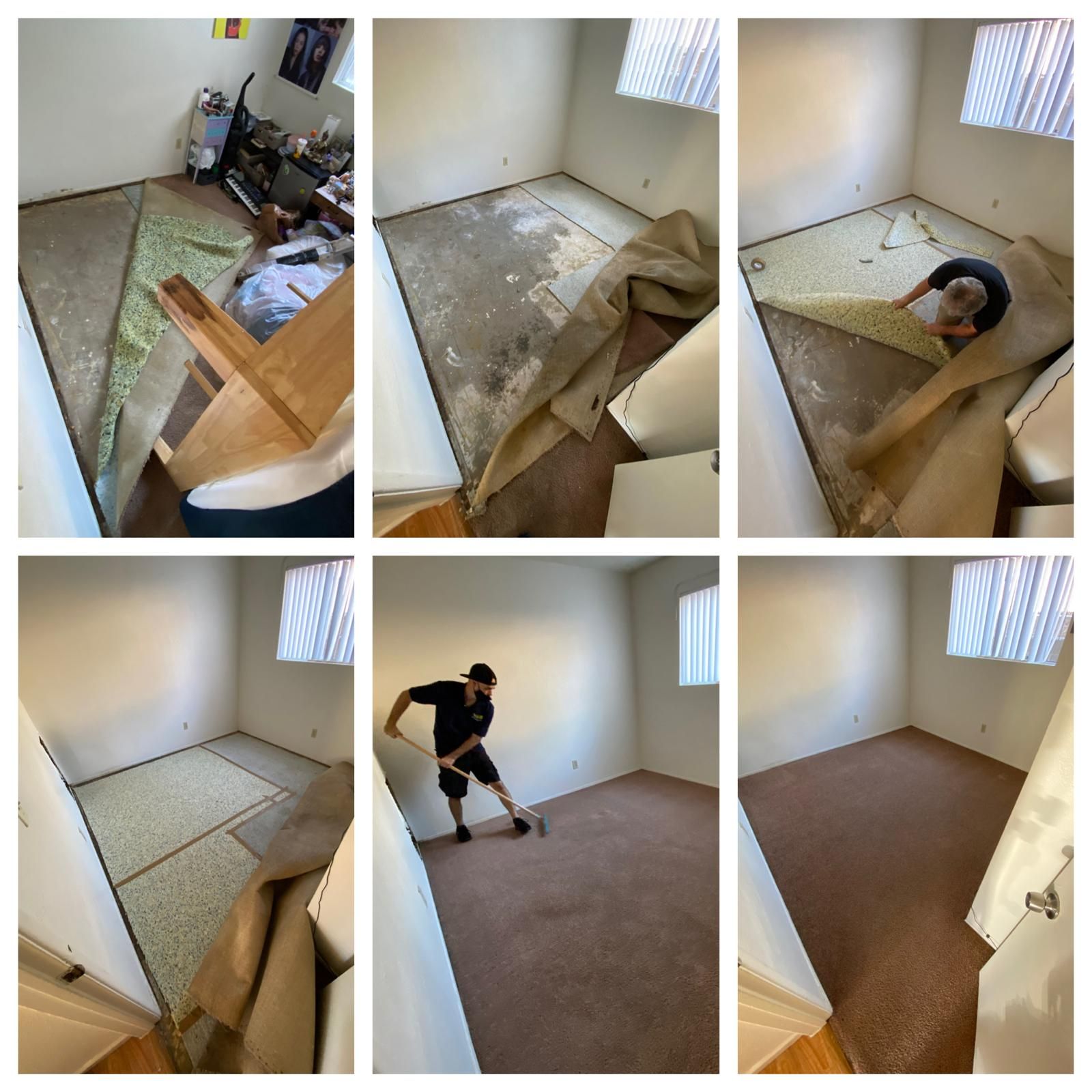 Worker removing old carpet from a small white room, revealing bare floor and a window.