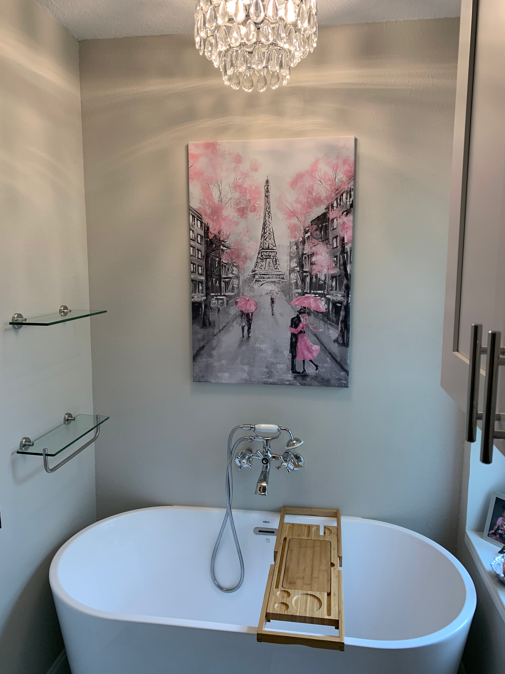 A bathroom with a bathtub and a walk in shower.