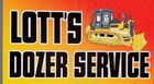 A sign with the text "LOTT'S DOZER SERVICE" in black, bold lettering against a yellow-to-red gradient, plus a yellow bulldozer.