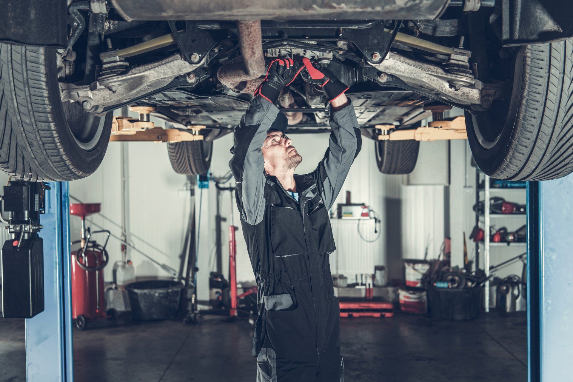 Mechanic Fixing Car On A Lift — Geelong VIC — Auto Express Service Centre & Mobile Mechanics
