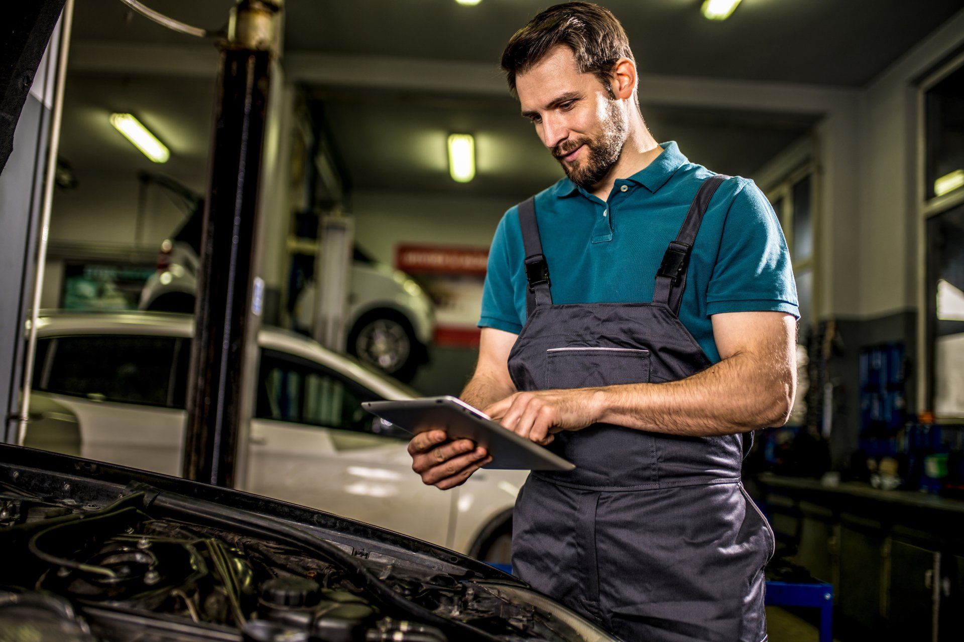 Mechanic Examining Car Diagnostics — Geelong VIC — Auto Express Service Centre & Mobile Mechanics