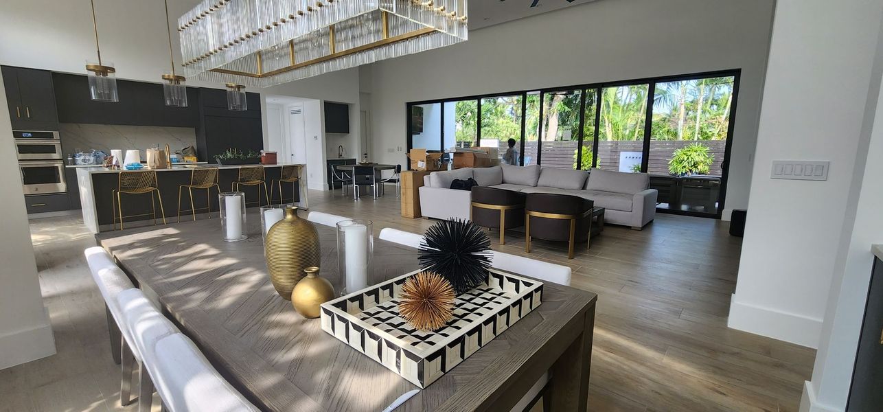 Light interior walls around an open living and kitchen space