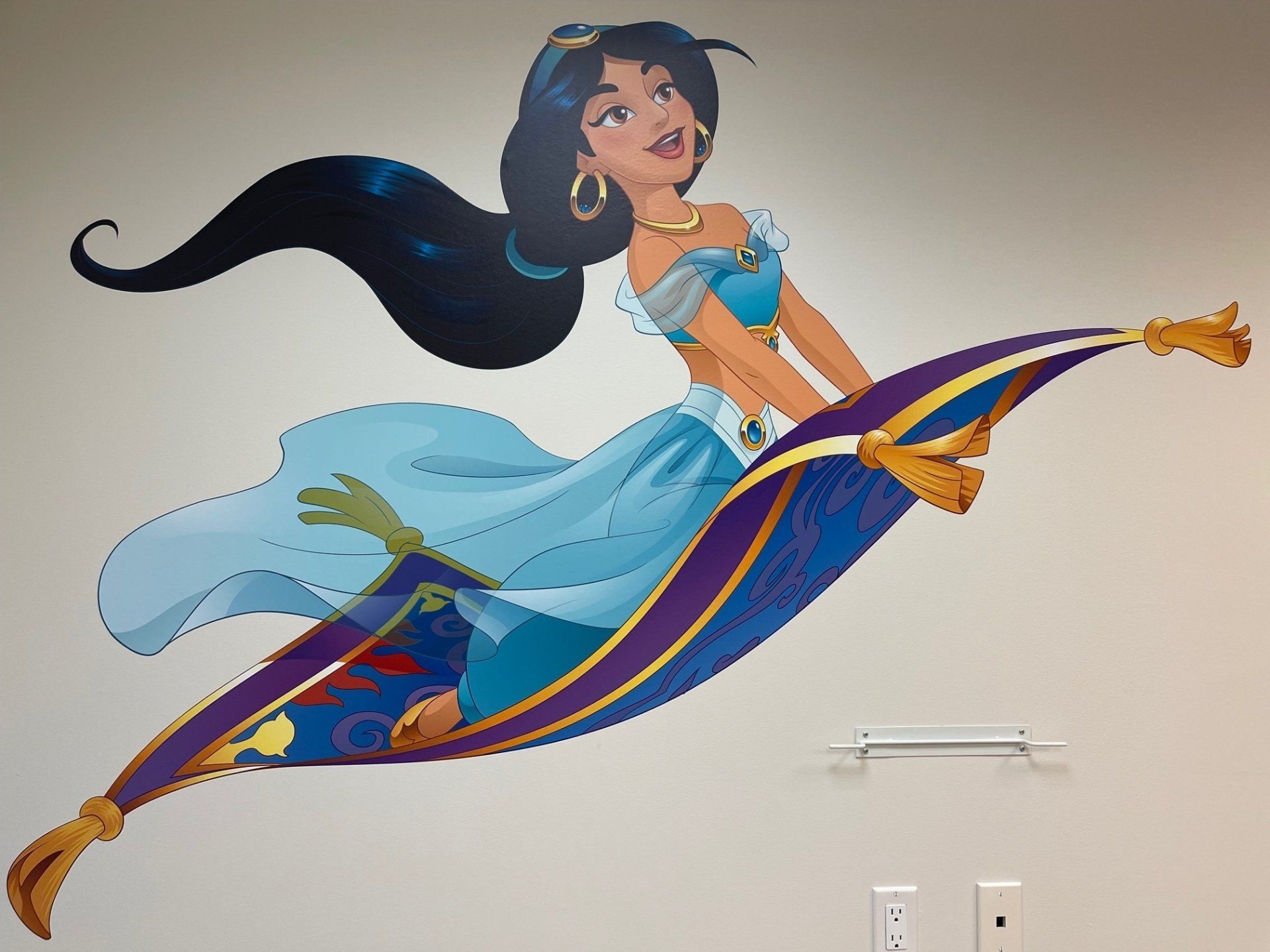 A painting of jasmine flying on a magic carpet