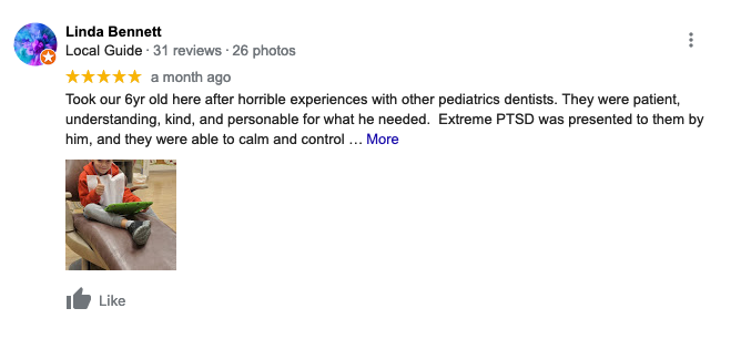 A review of a dentist on google with a picture of a person sitting in a chair.
