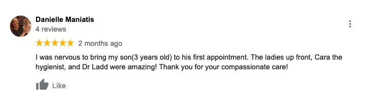 A blurred image of a google review for a dentist.