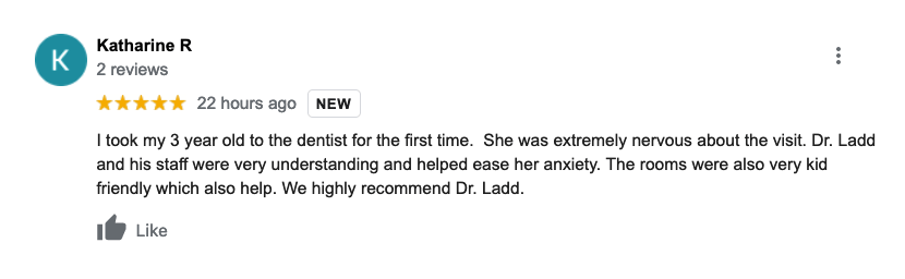 A blurred image of a google review for a dentist.