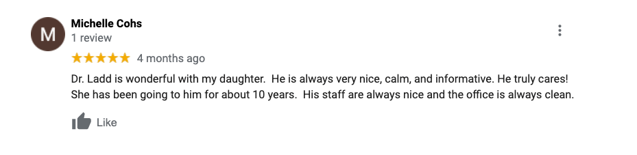 A blurred image of a review on a website.