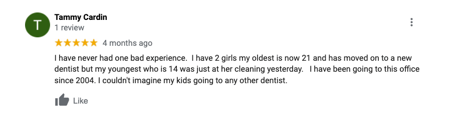 A blurred image of a person 's review on a google review page.