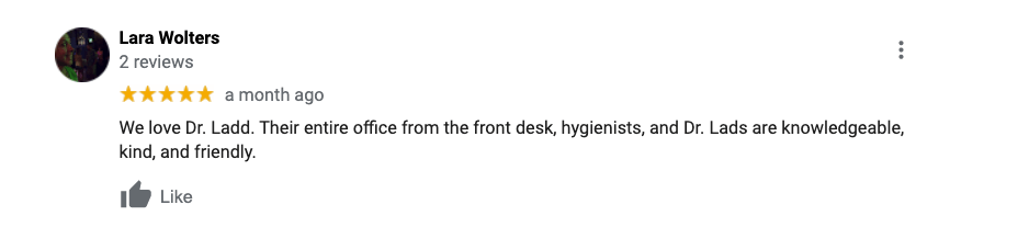 A blurred image of a person 's review on a google review page.