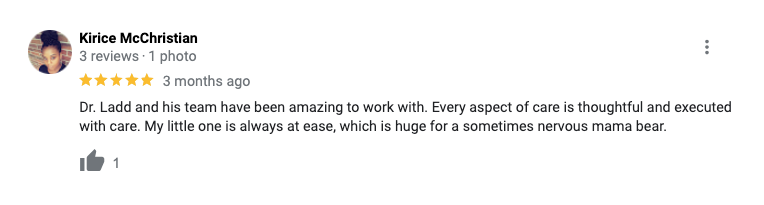 A blurred image of a person 's review on a google review page.