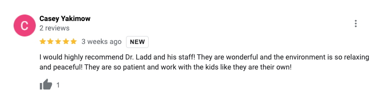A blurred image of a google review for a dentist.