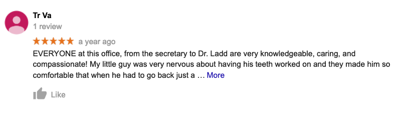 A blurred image of a google review for a dentist.
