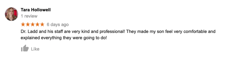 A blurred image of a person 's review on a google review page.