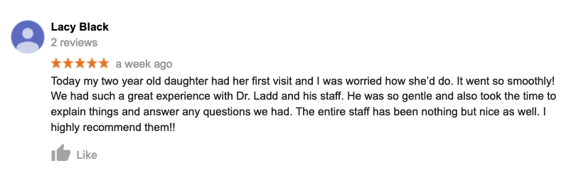 A blurred image of a person 's review on google.