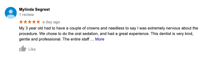 A blurred image of a google review for a dentist.